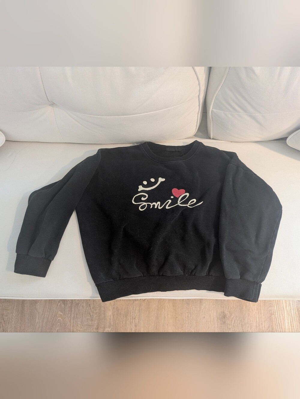Black Sweater with "Smile" and Heart Graphic